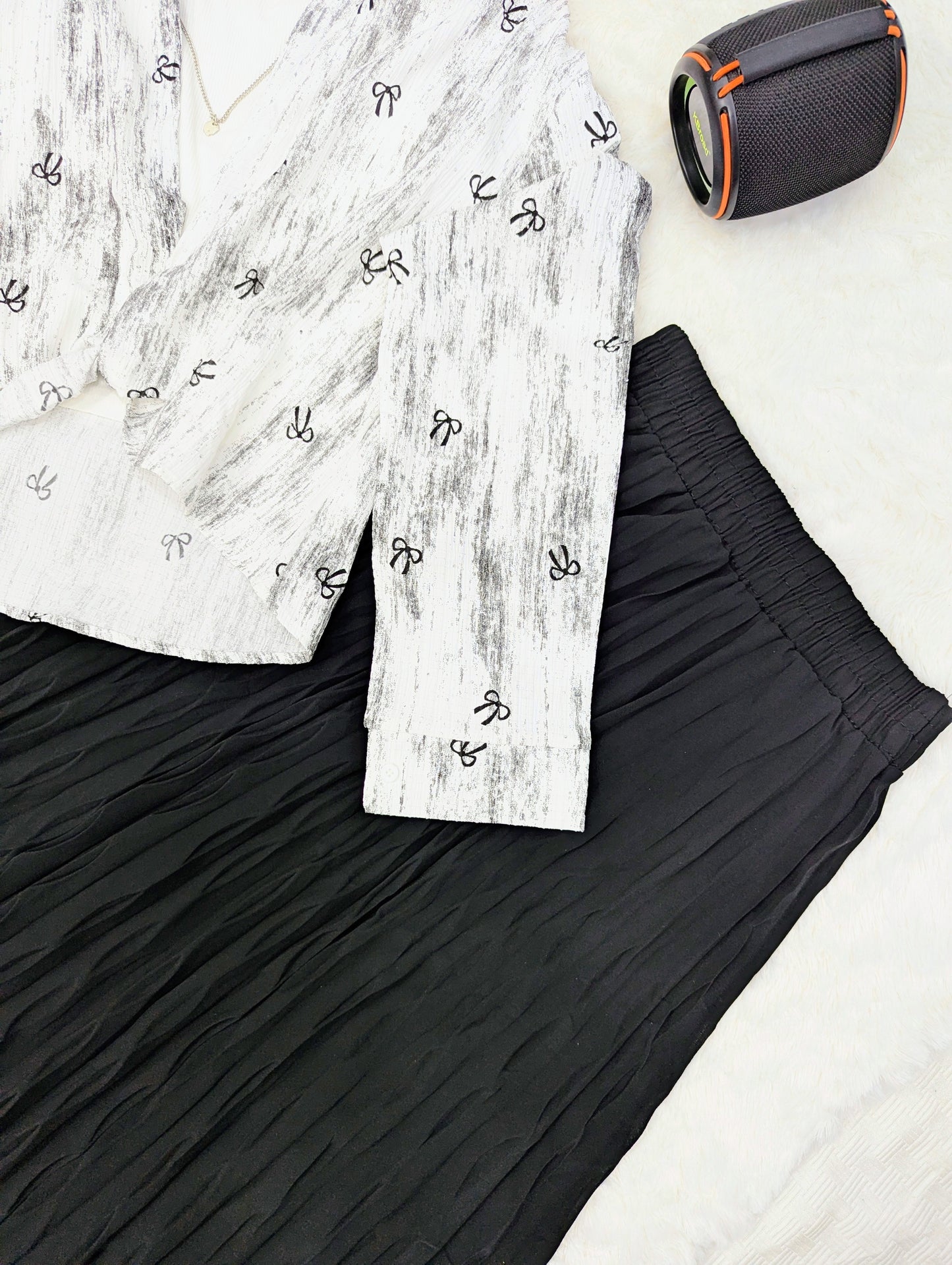 Chic Printed Top with Black Pleated Skirt – 2 Piece Set